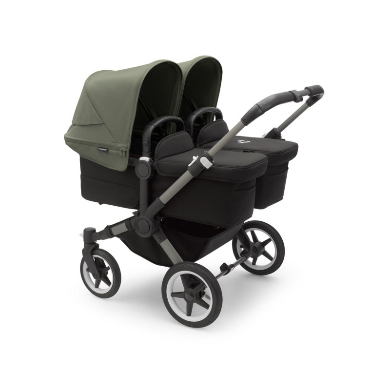Cochecito Bugaboo donkey 5 twin, con chasis grafito, funda negra y capota en verde bosque.