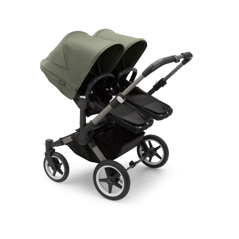 Silla de paseo Bugaboo donkey 5 twin, con chasis grafito, funda negra y capota en verde bosque.