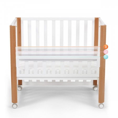 Minicuna Koya 4 en 1 de Kinderkraft, en función de colecho se puede ajustar la altura en 3 niveles.