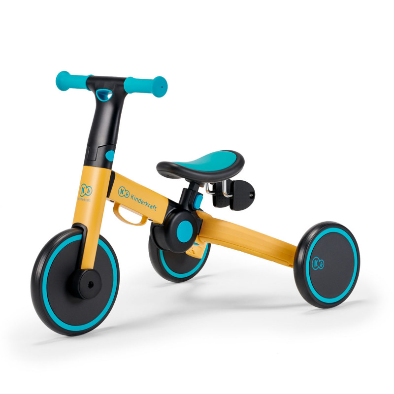 Triciclo 4TRIKE 3 en 1 de Kinderkraft en color yellow. Puedes guardar los pedales desmontados bajo el asiento del triciclo.