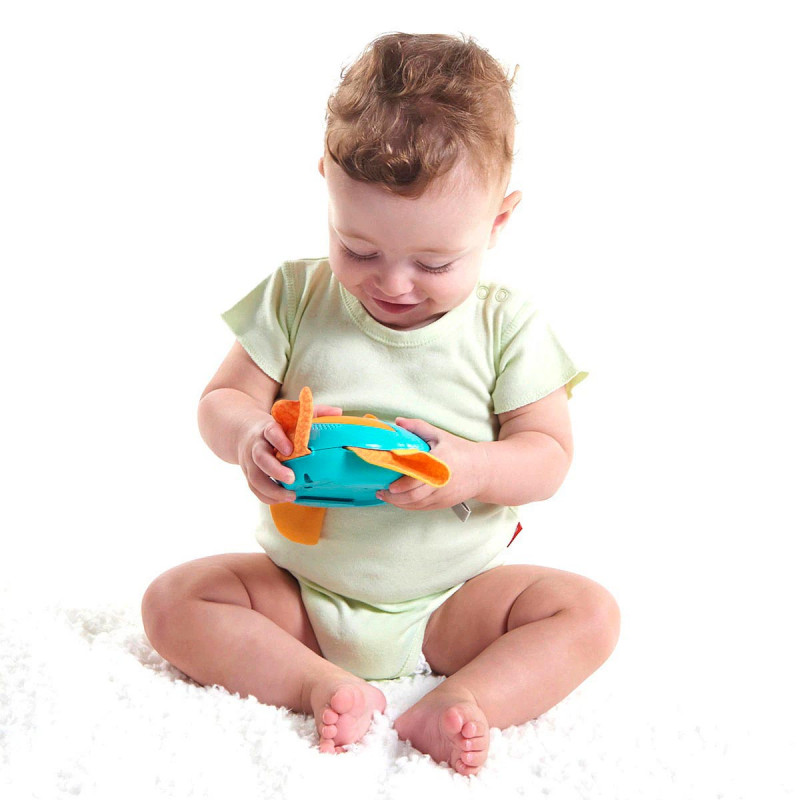 Alfombra de juego Meadow Days Dynamic Gymini de Tiny Love, contiene un juguete electrónico grabador con forma de pájaro.