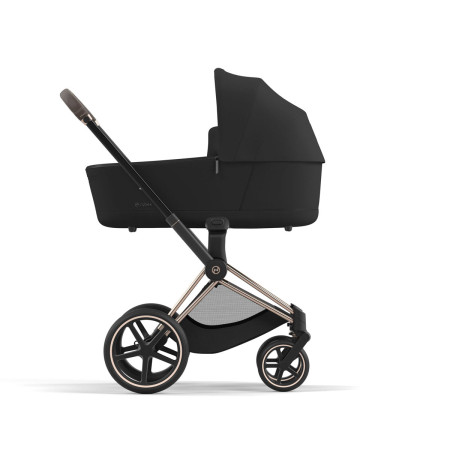 Cochecito Priam Platinum de Cybex, chasis rosegold y color de tejidos sepia black.