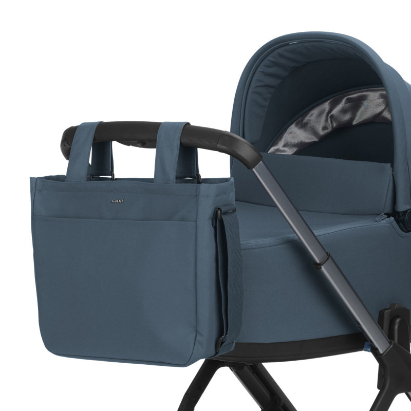 bolso para carrito de bebé Stroller bag de Jané en color azul seal colgado del manillar