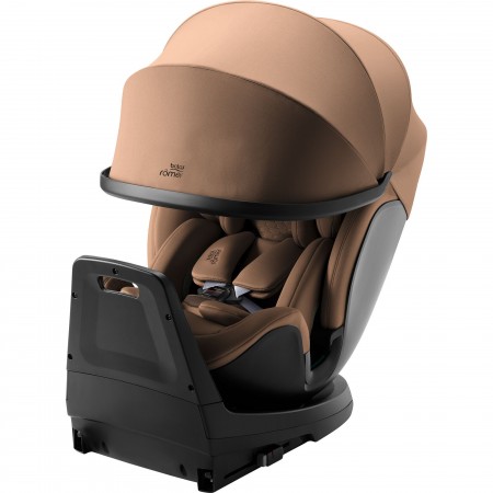 Detalle con la capota extendida y el reductor de recién nacido de SWIVEL-GROW MAX AIRen color Warm Caramel